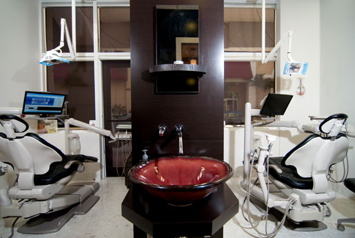 A sink and two dentistry machines in the office